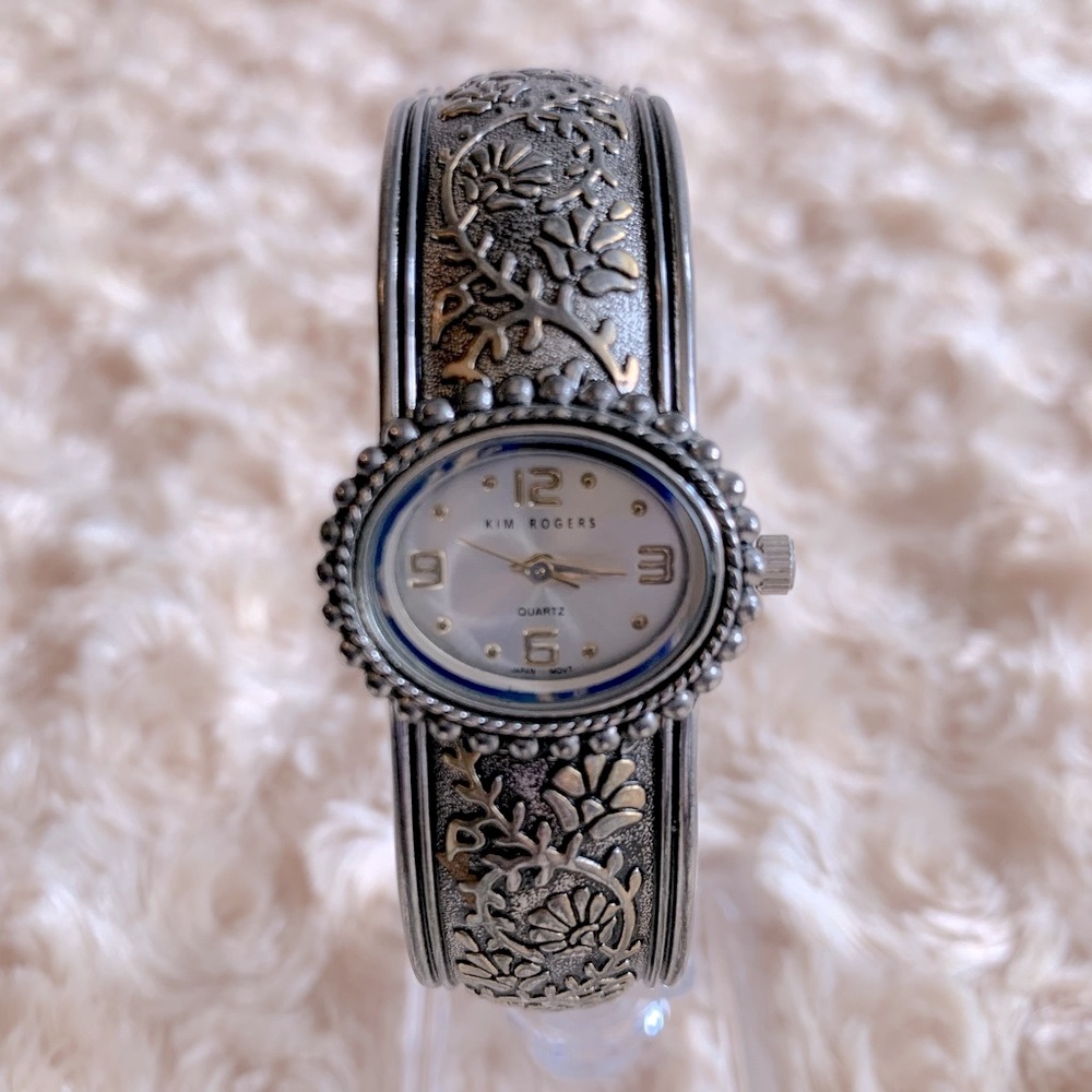 Kim Roger’s Silvertone Floral Design Bangle Watch